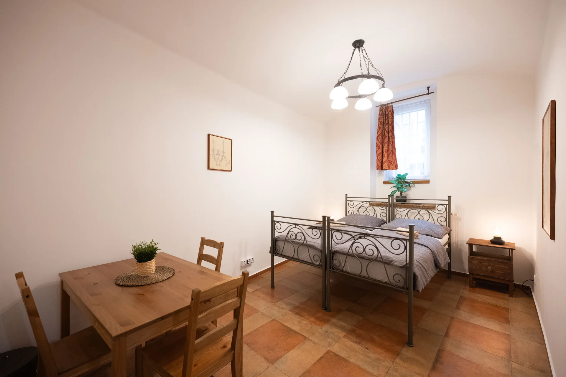 Bedroom with two iron-framed single beds