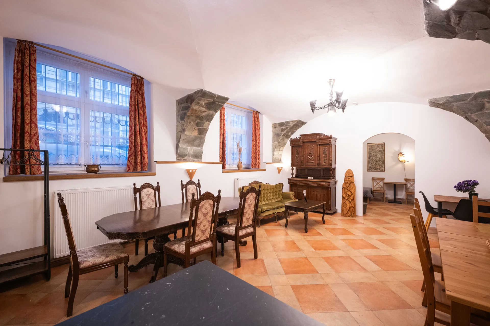 Dining room beneath vaulted ceilings